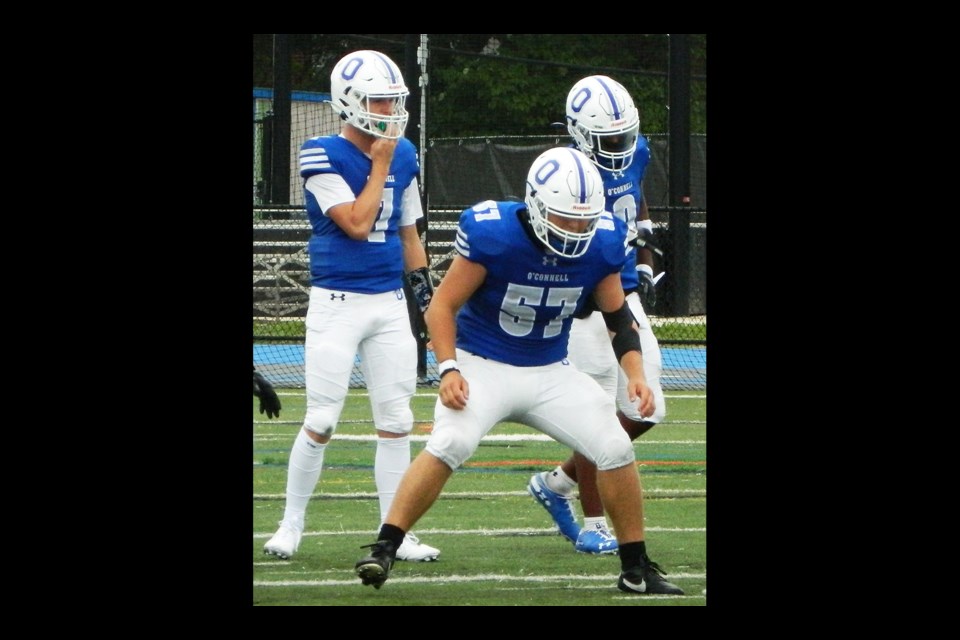 Bishop O'Connell quarterback Graham Deaton, lineman Sam Casolini Dal Bo and runningback Mikhai Martin and the Knights lost to Potomac School in Sept. 21 football action.