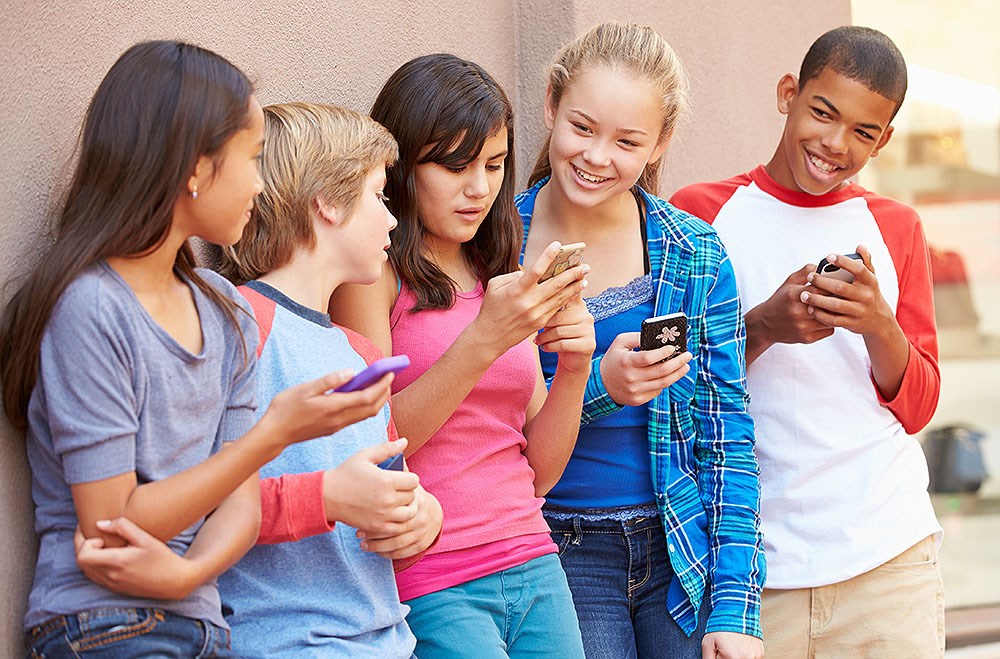 At some schools in Arlington, students’ cell phones are transported in “bags”