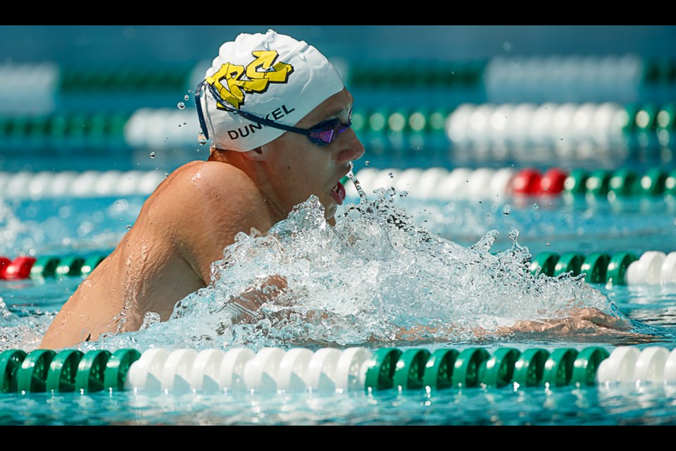 Tuckahoe's Nolan Dunkel  swims in the boys 15-18 medley relay.