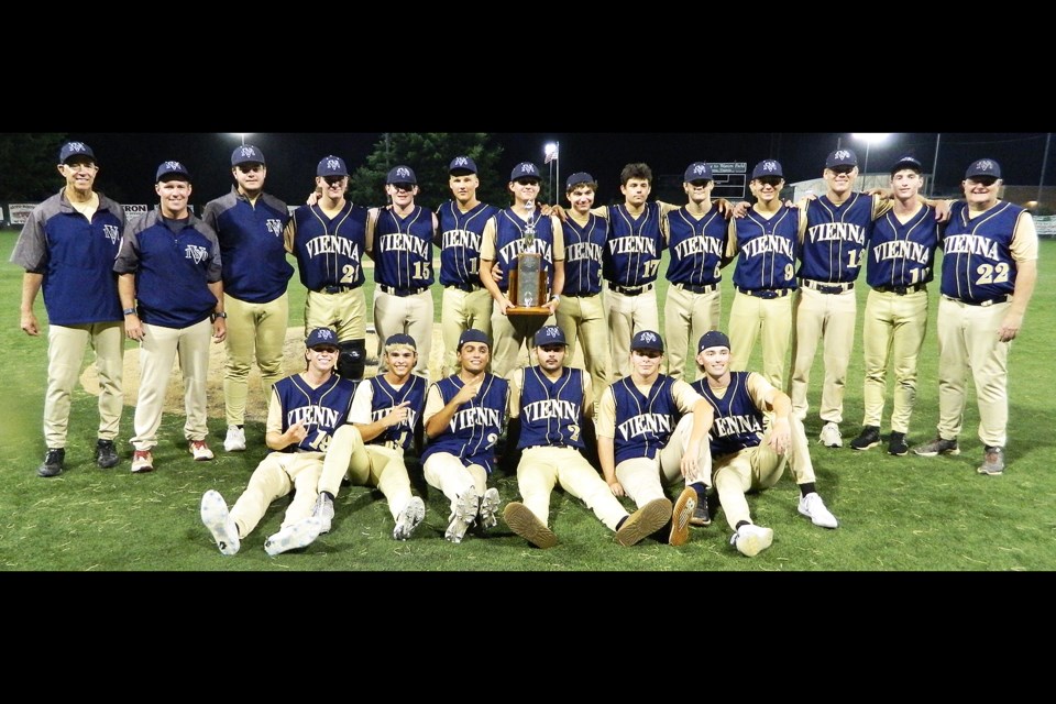 The Vienna Post 180 team gathers with the District 17 tournament championship trophy, it won for the third straight time.