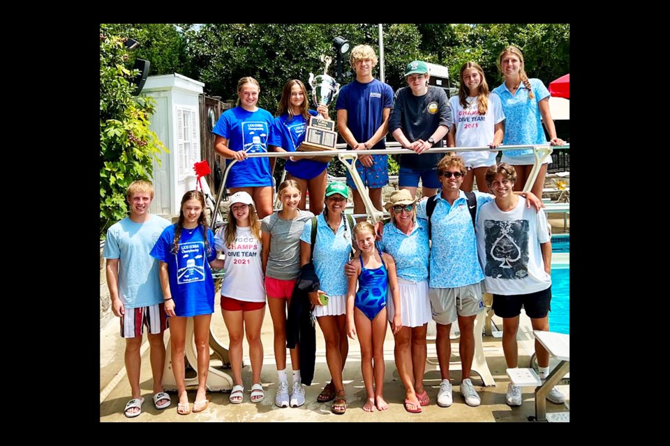 The Washington Golf & Country Club diving team gathers with the 2024 league-championship trophy.