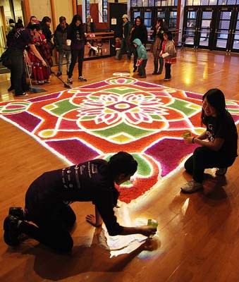 Diwali is the worldwide festival of lights, music, dance, food and crafts. Activities were enjoyed by all at the Roundhouse Community Centre. Rangoli is a colourful and decorative design made on floors and courtyards during Indian festivals.