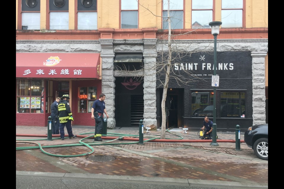 Firefighters respond after smoke was spotted coming from the doors of Saint Franks restaurant at 1320 Broad St. Tuesday afternoon.