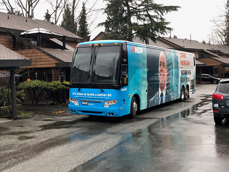 John Horgan kicked off the NDP's provincial election campaign Wednesday at a Port Moody townhouse complex, talking health care with residents along with Port Moody-Coquitlam candidate Rick Glumac.