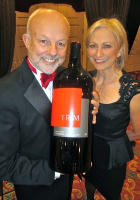 As the wine festival's new beneficiary, Bard on the Beach's Christopher Gaze, with his wife, Jennifer, and a nine-litre California bottle of Trim Cabernet Sauvignon, had much to cheer about.