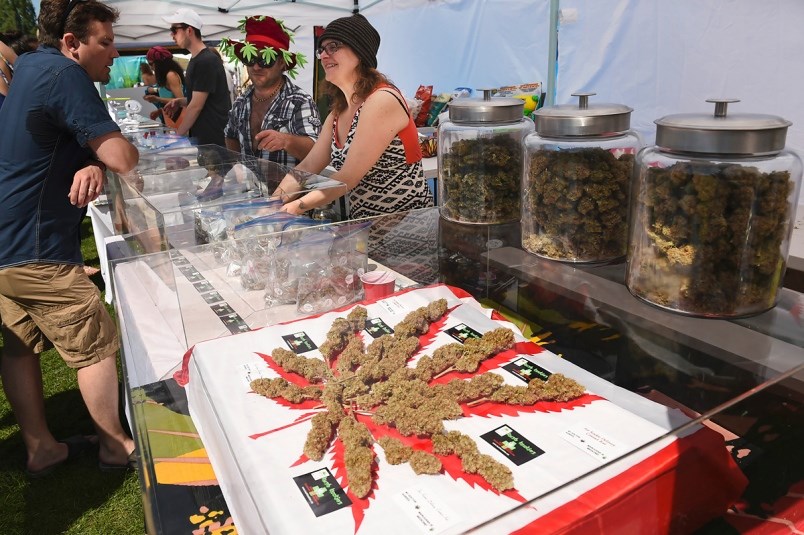 Cannabis vendors show off their dried plant products during the 4-20 rally at Sunset Beach in Vancou