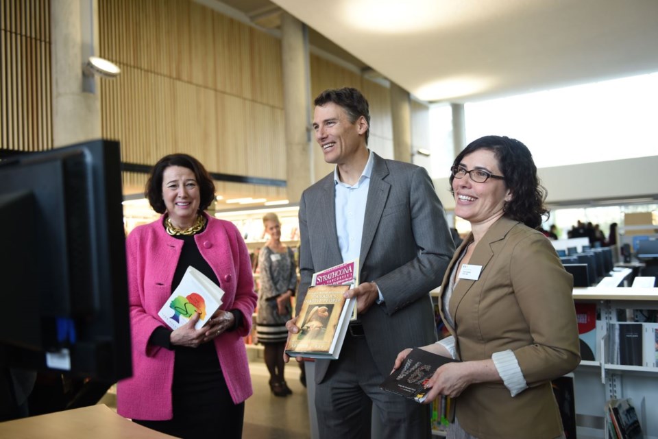 Janet Austin, CEO of Metro Vancouver YWCA, Mayor Gregor Robertson and Vancouver Public Library board