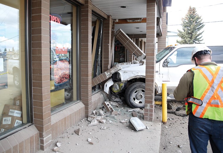 A vehicle drove through the front window at M&M Meats on Thursday afternoon. Details of the incident are not known at this time. Citizen photo by James Doyle