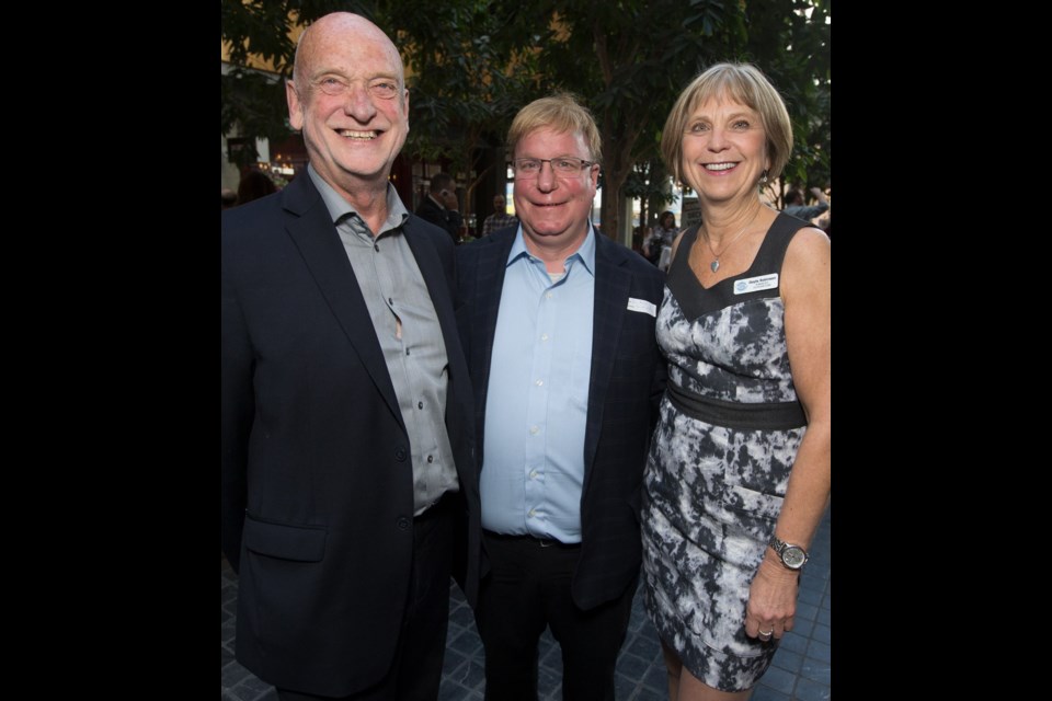 Incoming Think Local First president Paul Hadfield of Spinnakers, Tourism Victoria CEO Paul Nursey and outgoing Think Local First president Gayle Robinson of Robinson's Outdoor Store.