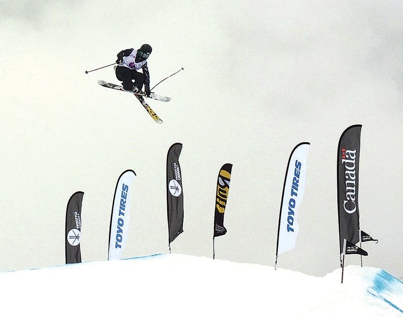 West Vancouver’s Skye Clarke soars above the slopes during the Canadian Junior Freestyle Skiing Championships held last month in Whistler. The 14-year-old won two golds and a silver in the U16 division. photo supplied