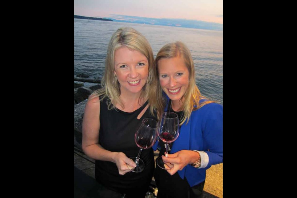 B.C. Wine Institute's Maggie Anderson and Kirsten Munro poured B.C.'s finest wines at Harmony Festival's Best of the West outdoor shindig.