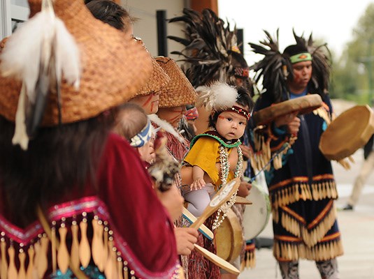 New Beginnings, To celebrate the new community centre and cultural education resource centre on the Musqueam Indian Reserve last Friday, folks including five-month-old Iyanla Johnson enjoyed traditional song and dance performances.