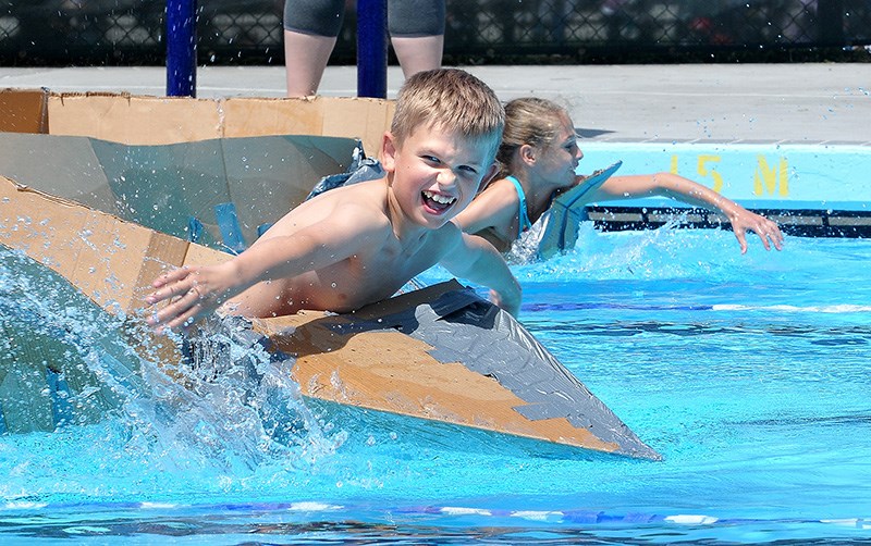 MARIO BARTEL/THE TRI-CITY NEWS
Grae 5 students from Pleasantside elementary school in Port Moody race their cardboard boats in Rocky Point pool on Wednesday. They were testing their ability to design and construct a watercraft with limited materials.