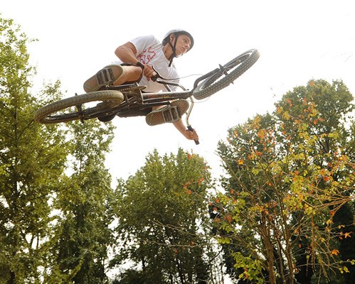 Kyle Heine, 17, soars over the jumps at the Vanier bike park Monday, a "professional development" day for Vancouver public schools.