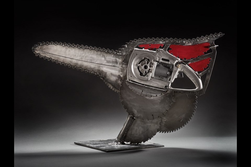 Peter McFarlane, Red Headed Woodpecker, stainless steel, at the Robert Bateman Centre.