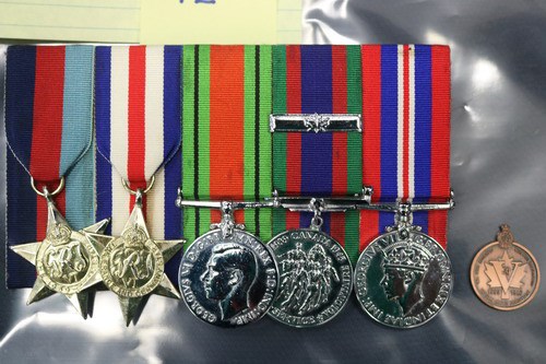 Burnaby Mounties looking for owner of military medals - Burnaby Now