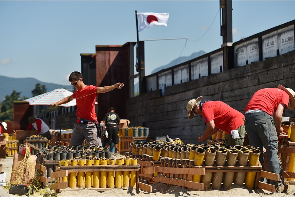 Preparations for the Celebration of Light fireworks were underway Friday. Photo Dan Toulgoet