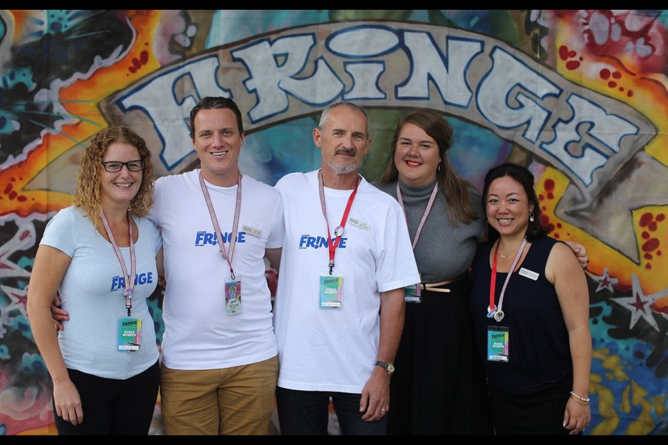 Victoria Fringe Festival board of directors members Janine Morris, left, Allan Chaffe, Andy Dawson Reid, Melanie Tromp Hoover and Yukari Peerless were ready for action in Centennial Square before 1,500 Fringe fans got a lively sneak preview.