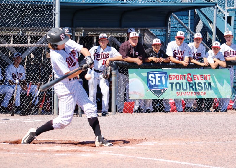 Kai Sands of the North Shore Twins blasts a three-run home run during the Canadian U15 championships held last week in Summerside, P.E.I. photo North Shore twins