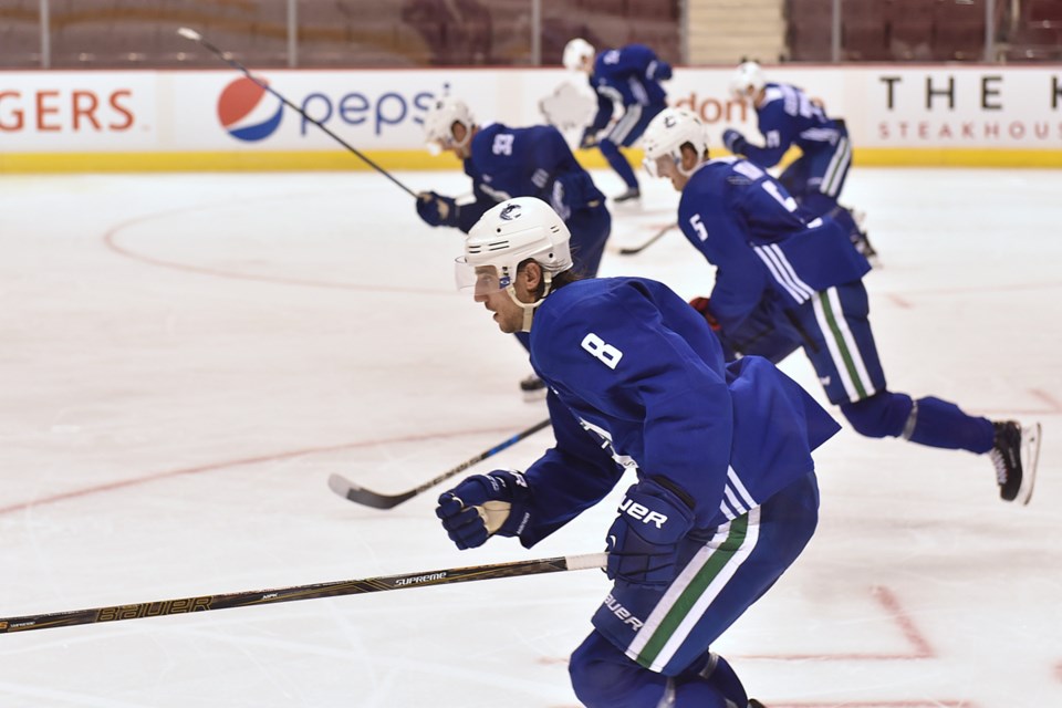 Canucks players go through drills at Rogers Arena Wednesday morning. Photo Dan Toulgoet