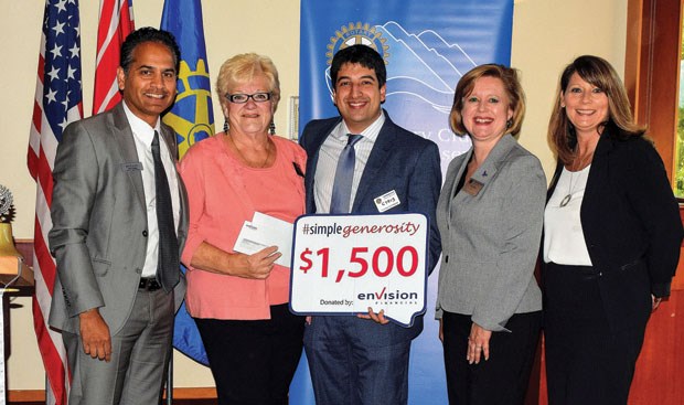 As part of Canada’s 150th birthday, Envision Financial Credit Union is recognizing community volunteers by providing a donation of $1,500 to the selected recipient’s charity. For her thousands of hours of volunteer work, Envision selected local Rotarian Leslie Abramson. She was awarded the honour last Thursday. Pictured (left to right) are assistant vice-president of retail banking Ken D’Sena, Leslie Abramson, assistant branch manager of the Tsawwassen branch Cyrus Mazdine, Rotary Club of Tsawwassen president Laura Dixon and senior manager of community investment Susan Byrom.