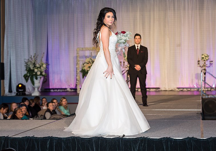A model shows off the latest in bridal gown styles during the Storybook Wedding fashion show that was held during the Storybook Wedding Bridal Expo on Sunday at the Prince George Civic Centre. Citizen Photo by James Doyle October 29, 2017