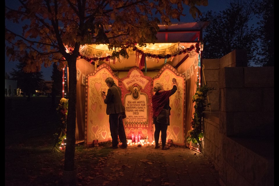 All Souls night at Mountain View Cemetery is one of a series of non-denominational sacred gatherings curated by artists Paula Jardine and Marina Szijarto. The artists have encouraged the use of shrines to honour the dead in local community events. Photo Rebecca Blissett