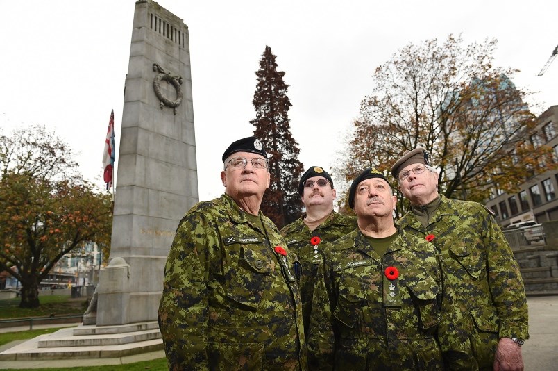 The largest Remembrance Day ceremony in 鶹ýӳtakes place Nov. 11 at the Victory Square cenotaph. Photo Dan Toulgoet