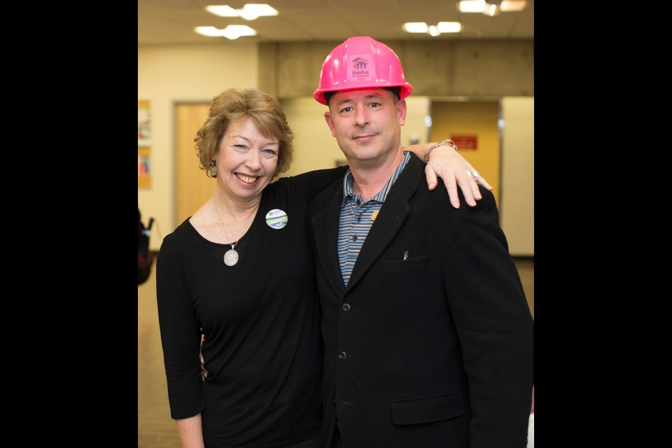 Nancy Taylor with Habitat for Humanity and Mike Grivel with Volunteer Victoria at Volunteer Victoria's Camosun Volunteer Fair.