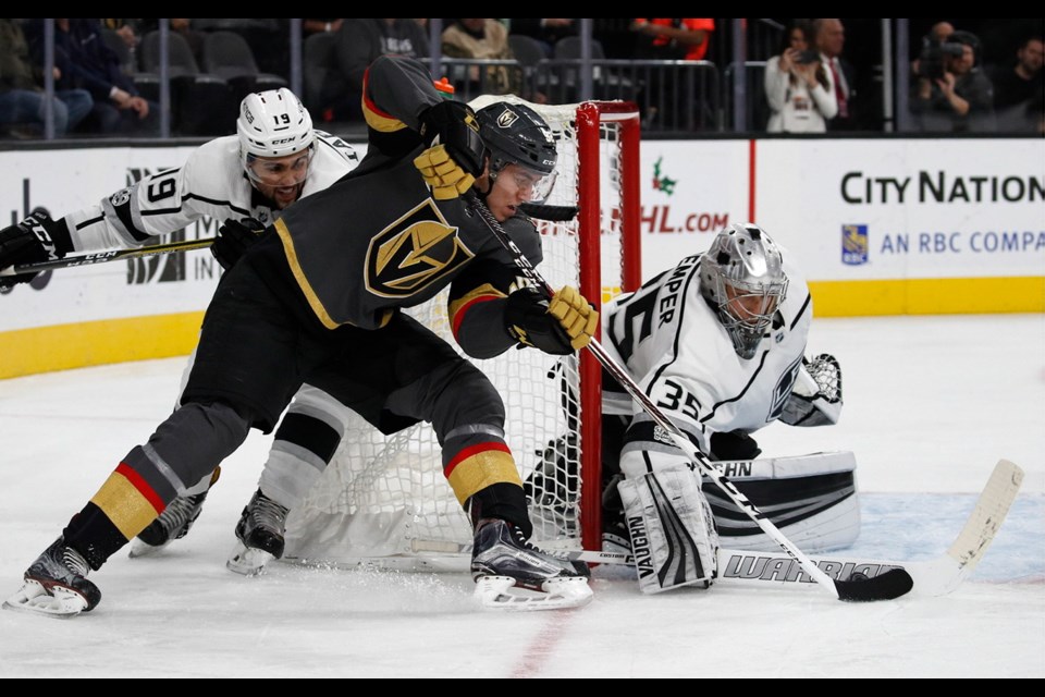 Vegas Golden Knights left wing Tomas Nosek attempts a shot on Los Angeles Kings goalie Darcy Kuemper during the second period of Sunday's game in Las Vegas.