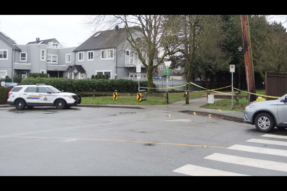 Police tape cordons off a path on Lynas Lane a few hundred yards south of Westminster Highway, the scene of a suspected shooting on Thursday night.