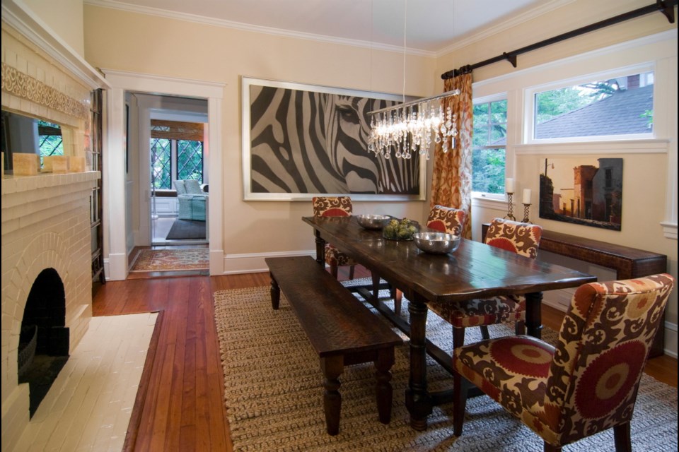 A dining room in Charlotte, North Carolina, was designed by Laura Casey around a photograph of a zebra in Africa. She incorporated complementary colours, textures and patterns, using Moroccan-inspired tiles.