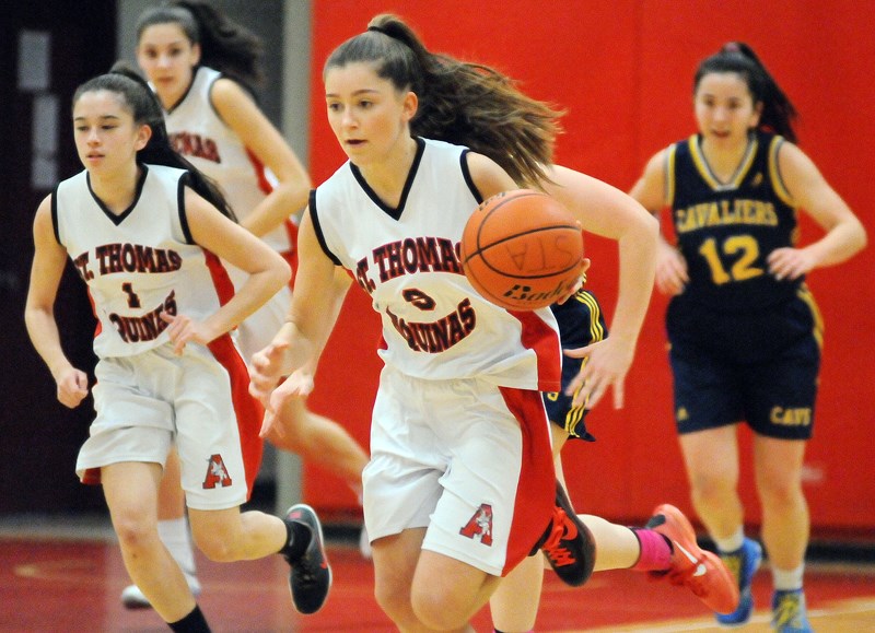 St. Thomas Aquinas beat Collingwood Monday to earn a berth in tonight's North Shore senior girls AA basketball final. photo Cindy Goodman, North Shore News