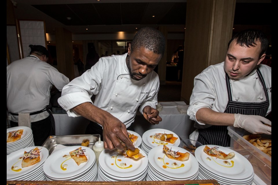 Chef Castro Boateng makes African fish and chips at Hungry Hearts: A savoury soir&eacute;e for Our Place at the Inn at Laurel Point on Wednesday.