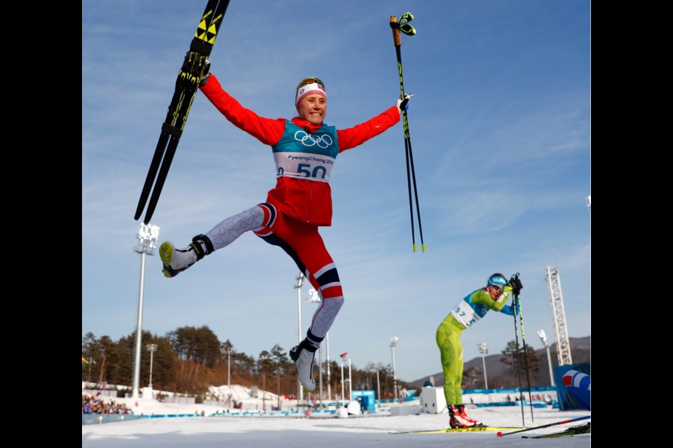 Ragnhild&Ecirc;Haga, of Norway, celebrates after winning the gold medal in the women's 10km freestyle cross-country skiing competition at the 2018 Winter Olympics in Pyeongchang, South Korea, Thursday, Feb. 15, 2018.