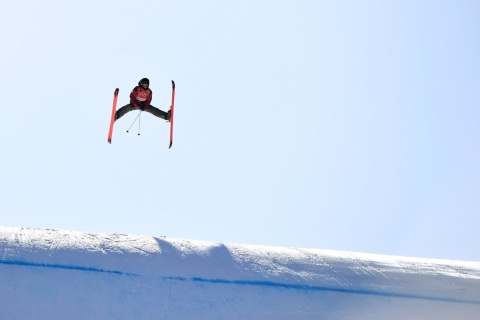 saʴý's Yuki Tsubota of Whistler, saʴý flies through the air in a women's freestyle skiing slopestyle final round at the Phoenix Snow Park at the 2018 Winter Olympic Games in Pyeongchang, South Korea, Saturday, Feb. 17, 2018.