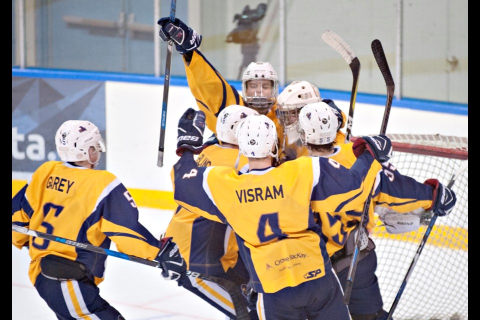 Delta Ice Hawks celebrate their 2-1 series-clinching win over the Richmond Sockeyes on Sunday night. They return to the Pacific Junior Hockey League finals for the second straight year.