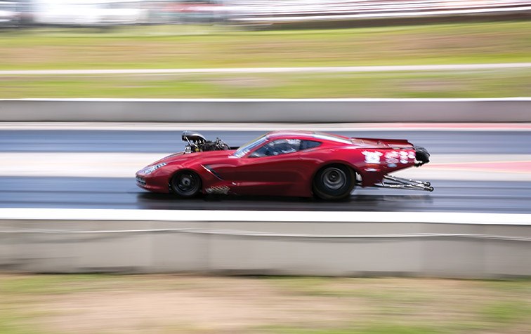 David Kowalski of Ft. St. John speeds down the drag strip at NITRO Motorsports Park on Saturday afternoon. The track was filled with cars from all over B.C. competing in the Points Race Weekend #1 and the North vs South All Door Car Shootout. Citizen Photo by James Doyle