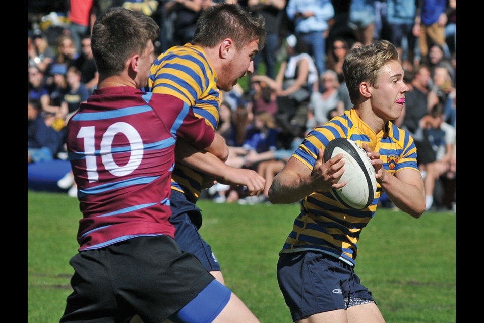 Collingwood’s Ethan Lucke finds running room during a recent North Shore game. Lucke scored two electric tries off of interceptions as Collingwood topped Brentwood in the senior provincial AA rugby final Saturday at Abbotsford’s Rotary Stadium. photo Paul McGrath, North Shore News