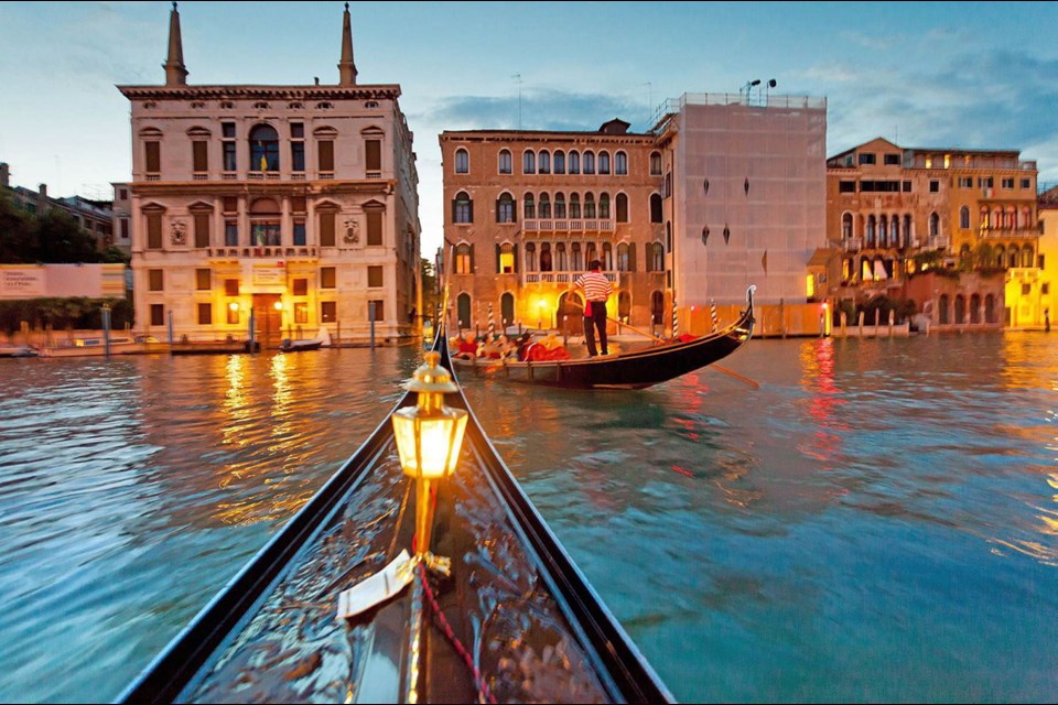 Although expensive, riding a gondola through Venice at night is one of the great experiences in Europe.