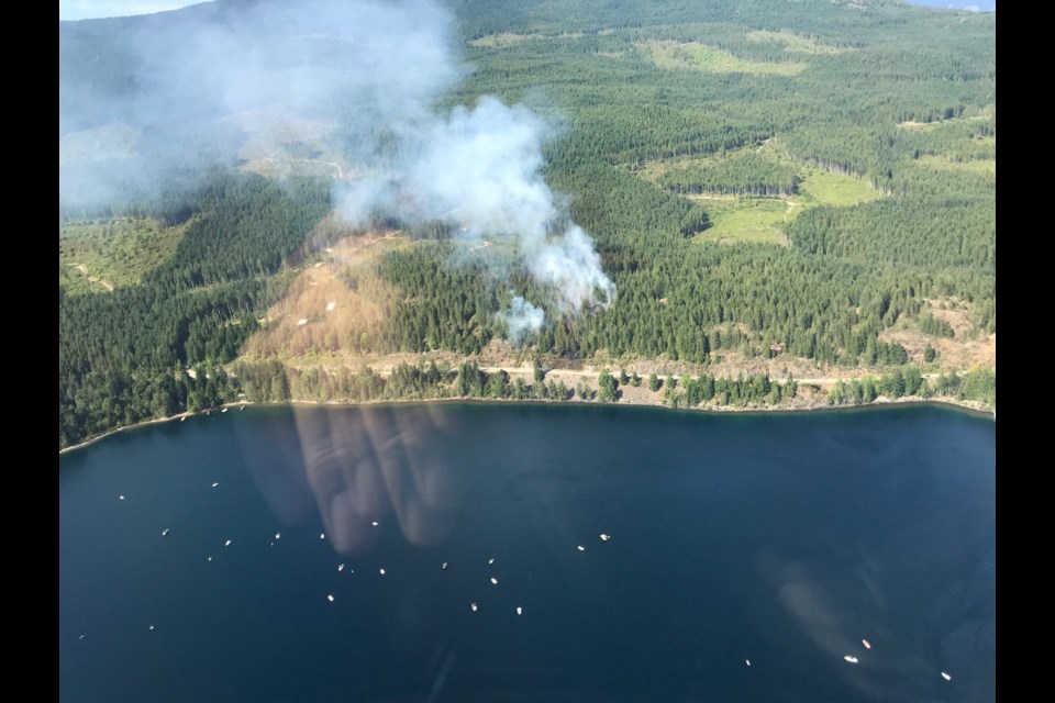 A wildfire estimated at one hectare in size was burning about 15 kilometers west of Port Alberni near Taylor Arm Provincial Park and Sproat Lake on Saturday, July 21, 2018.