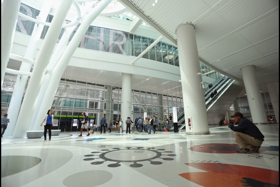 Tourists take photos inside the new San Francisco Transbay Transit Center in San Francisco.