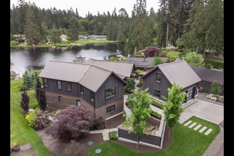 This Woodinville-area home was angled to get the best views of the lake. It has three bedrooms more than 2,600 square feet and a 300-square-foot guest suite over the detached garage.