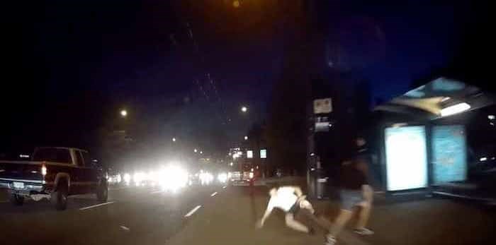 Man pushed into traffic