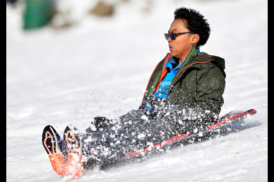 12-year-old Jako Plummer sleds on Burnaby Mountain.