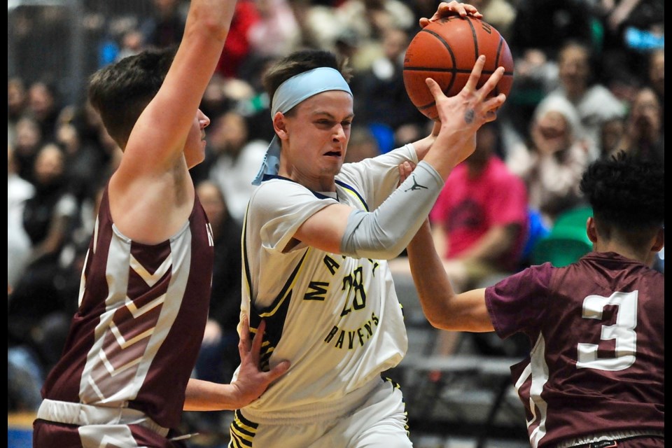 MacNeill's Hudson Swaim works his way to the basket in Wednesday's semi-final win over the Richmond Colts at the Lower Mainland AAA Championships at the Olympic Oval.