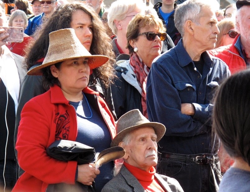 Bill Lightbown, along with Marnie York, grandson Riley and son, Bill Lightbown Jr. at the raising of