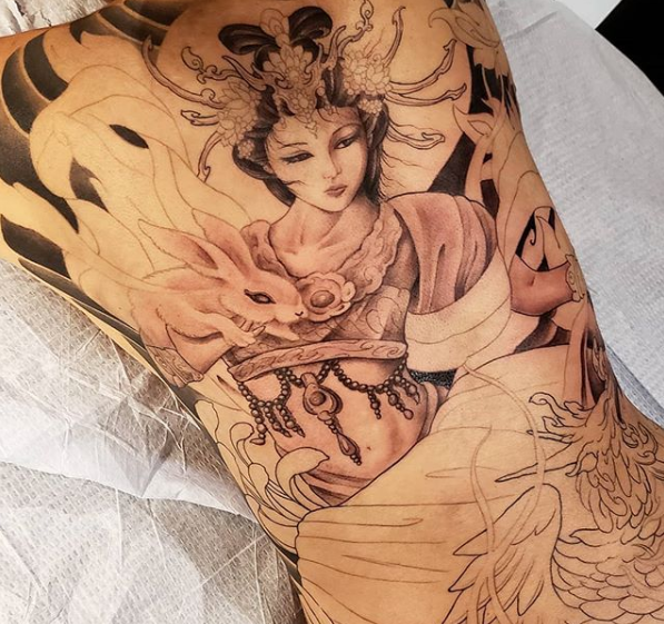 Carson Yip woman tattoo