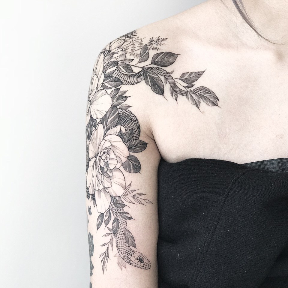 Snake and flower tattoo