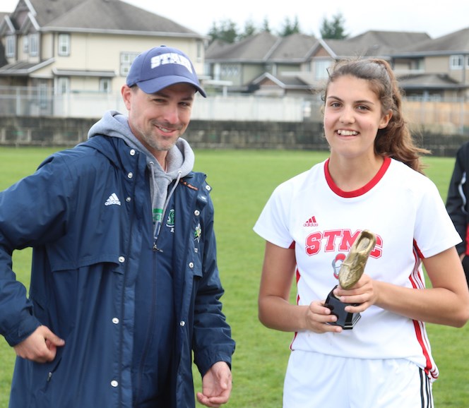 St. Thomas More's Kaya Crescenzo receives the tourney's MVP award after helping lead her Knights to the B.C. senior girls AA soccer title last week in Campbell River.